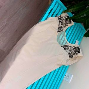 A sequin creme dress